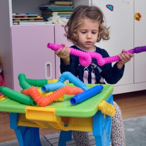 Pop Tubes for ADHD: Colorful, stretchy tubes that make relaxing popping sounds for stress relief and focus improvement.